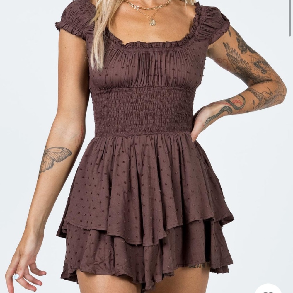 The love galore romper is brown, only worn one time.